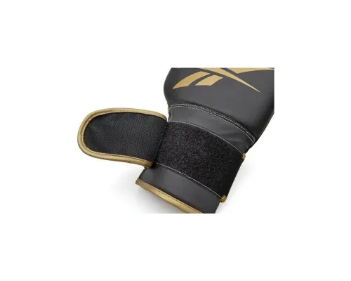 Боксерські рукавички Reebok Boxing Gloves чорний, золото RSCB-12010GB 12 унцій (885652021180)