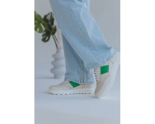 Стильні жіночі бежеві шкіряні кросівки з зеленими вставками та перфорацією