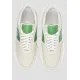 Стильні жіночі бежеві шкіряні кросівки з зеленими вставками та перфорацією